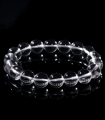Genuine natural clear quartz bracelet on wrist for clarity