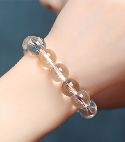 Genuine natural clear quartz bracelet on wrist for clarity